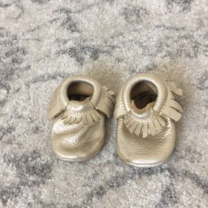 Freshly picked gold leather moccasins